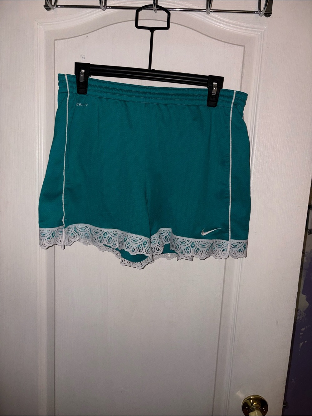 Upcycled Nike Women's Teal Athletic Shorts with Lace Trim